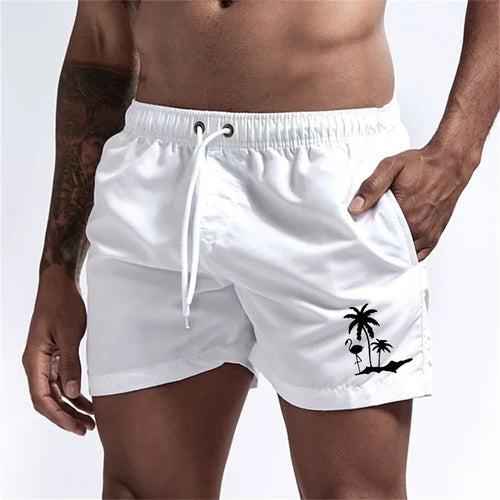 Pantalones cortos con estampado de árbol de coco y flamenco para