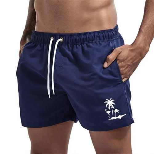 Pantalones cortos con estampado de árbol de coco y flamenco para