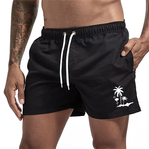 Pantalones cortos con estampado de árbol de coco y flamenco para
