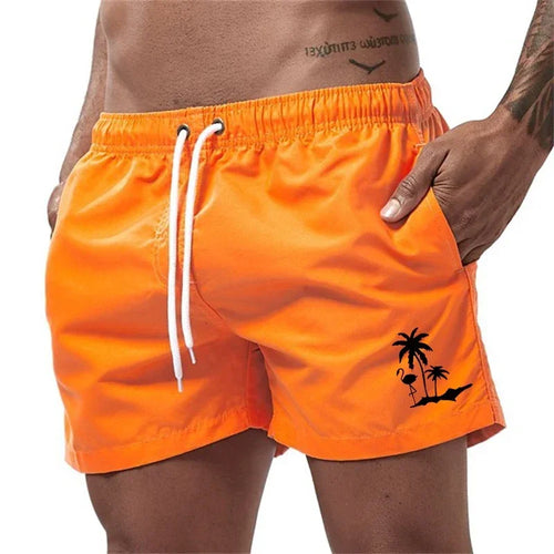 Pantalones cortos con estampado de árbol de coco y flamenco para