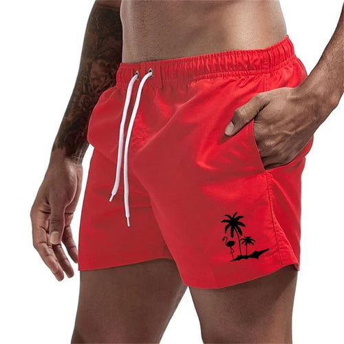 Pantalones cortos con estampado de árbol de coco y flamenco para