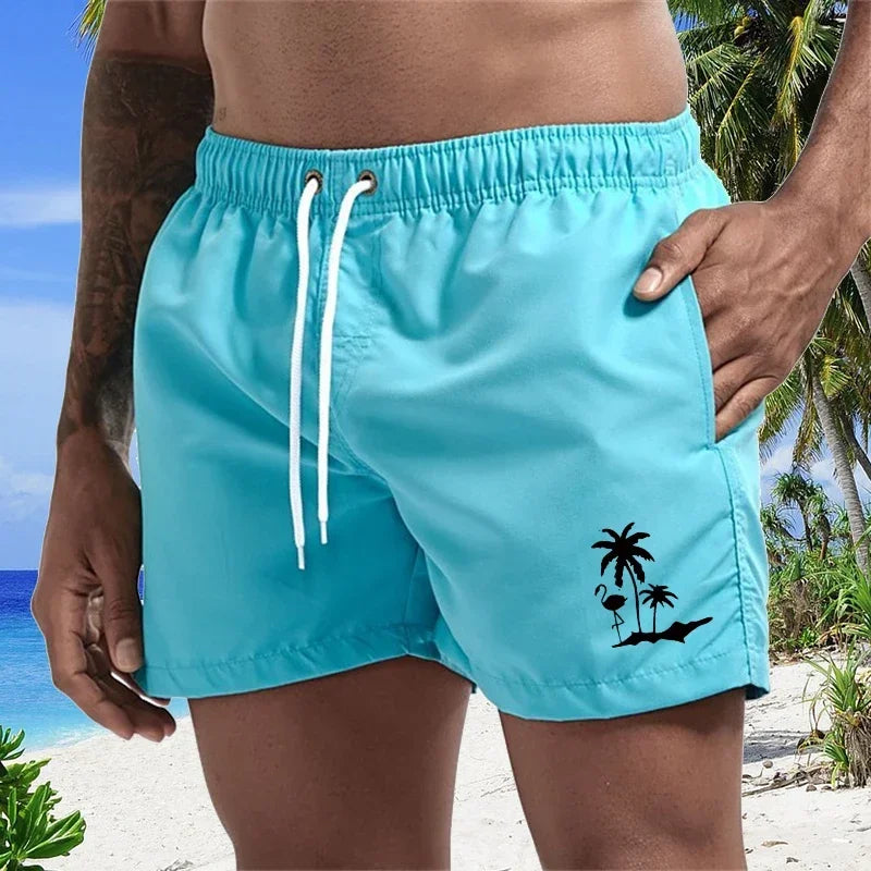 Pantalones cortos con estampado de árbol de coco y flamenco para