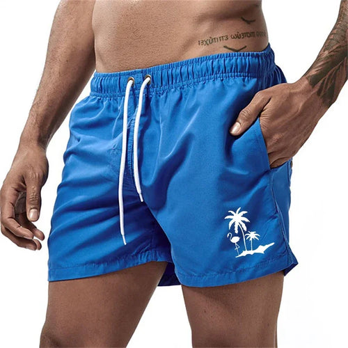 Pantalones cortos con estampado de árbol de coco y flamenco para